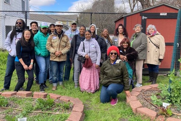 feb-2023-2nd-ward-community-garden-tour-3 Ms. Delores McGruder, one of Teresa Davis's flow fund recipients, leads community members on a garden tour. Photo by Teresa Davis.
